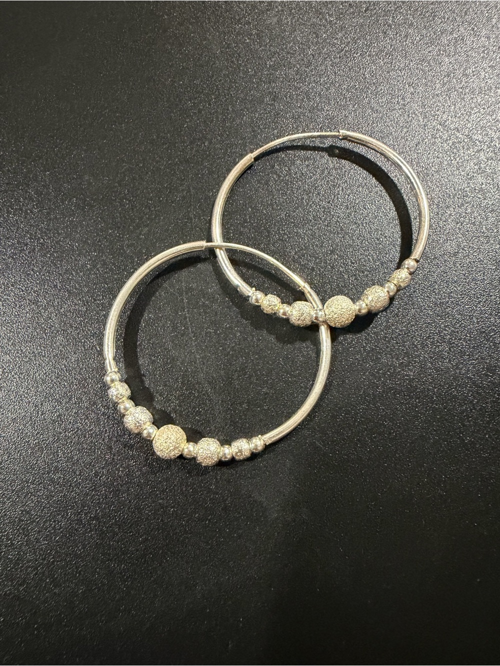 Sterling Silver Hoop Earrings with Textured Bead Accents silver .925